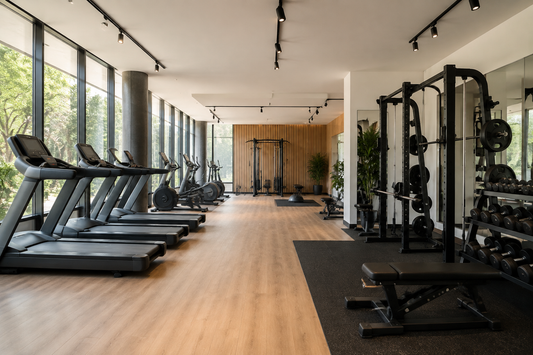 Bright modern gym with organized strength and cardio equipment