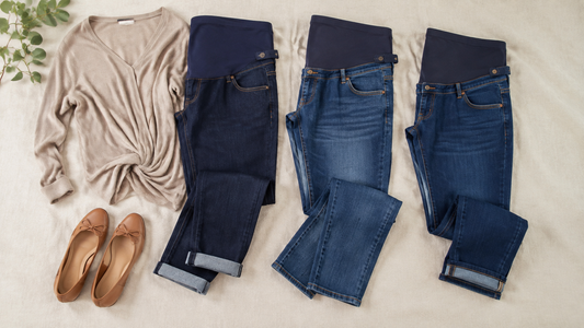 Three maternity jeans styles with stretch panels arranged with a soft knit top and comfortable flats