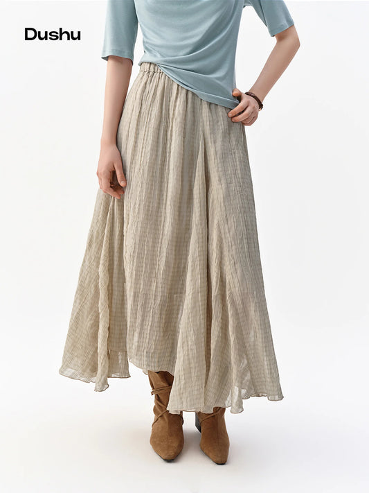 DUSHU Retro Nomadic Style Plaid Midi Skirt Women Irregular Design New Autumn 2026 Elastic Waist Casual Midi Skirt Khaki
