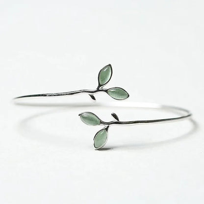 1 handmade tree leaf bracelet with green cat's eye stone - a stylish and elegant accessory, perfect as a gift for your bestie.