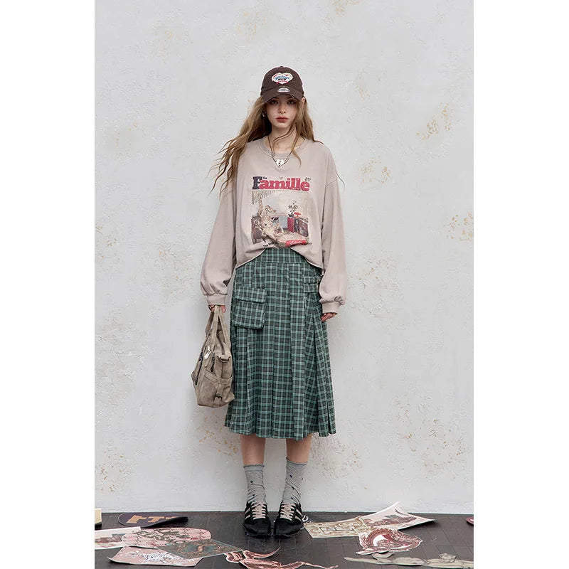 ELFSACK 2025 Autumn New Arrival Casual Checkered Pocket Asymmetric Pleated Street Style Midi Skirt For Woman