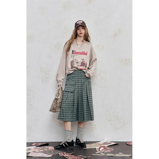 ELFSACK 2025 Autumn New Arrival Casual Checkered Pocket Asymmetric Pleated Street Style Midi Skirt For Woman