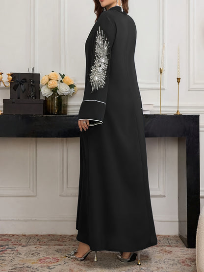 عباية نسائية طويلة الأكمام بتصميم A-line، بلون موحد، برقبة على شكل V، بتطريز خرز وتفصيلات متناقضة